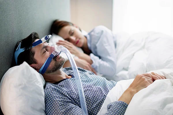 man with a cpap mask