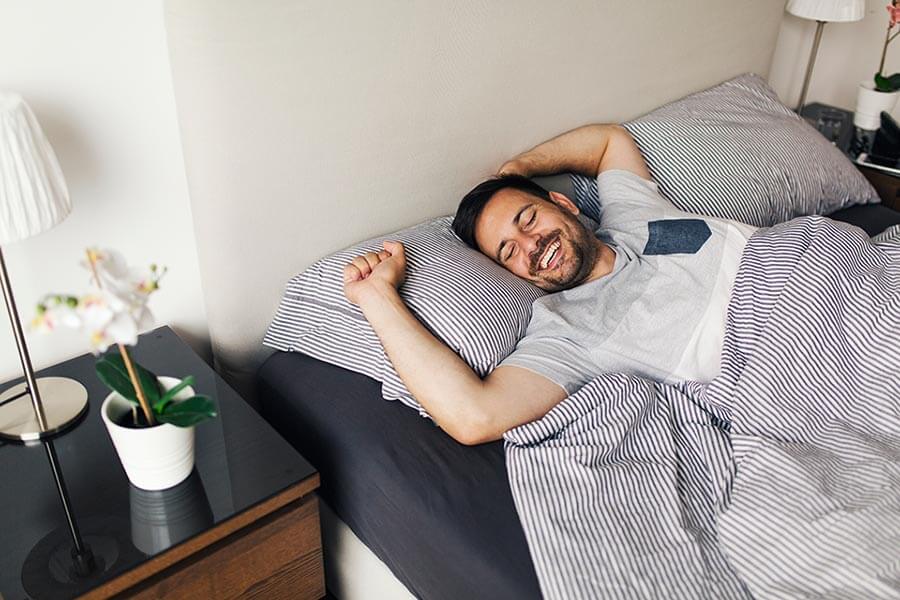 man feeling well-rested when using sleep apnea treatment